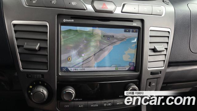 KG Mobility (SsangYong) Korando Turismo 4WD GT 11-seater 2014 — фото 15