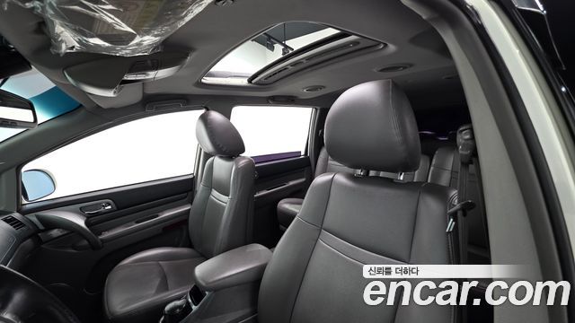 KG Mobility (SsangYong) Korando Turismo 4WD GT 11-seater 2014 — фото 17