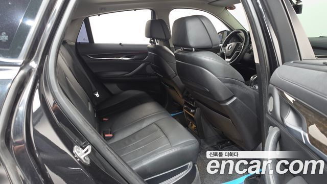 BMW X6 (F16) xDrive 40d 2016 — фото 11