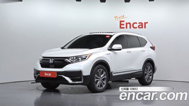 Honda CR-V (V) 2.0 Hybrid Touring 4WD 2022 — фото 1