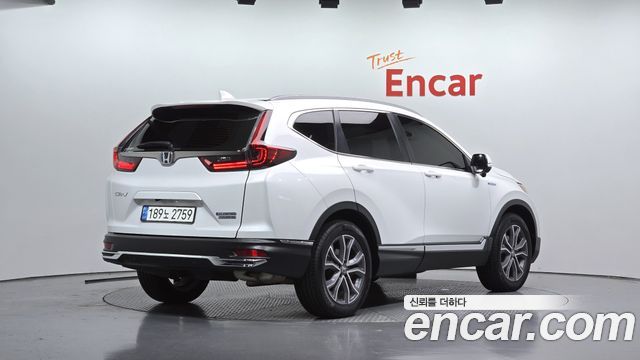 Honda CR-V (V) 2.0 Hybrid Touring 4WD 2022 — фото 2