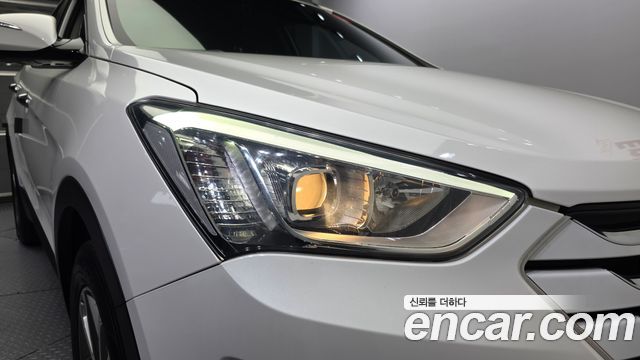 Hyundai Santa Fe (DM) Diesel(e-VGT) 2.0 4WD Premium 2014 — фото 22
