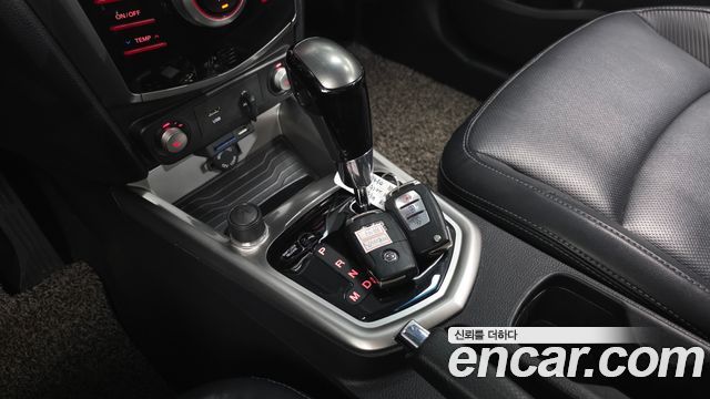KG Mobility (SsangYong) Tivoli VX 2WD 2015 — фото 9