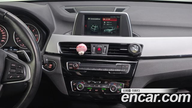 BMW X1 (F48) xDrive 20d Joy 2018 — фото 14