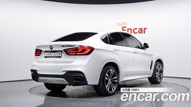 BMW X6 (F16) M50d 2017 — фото 2