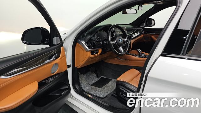 BMW X6 (F16) M50d 2017 — фото 10