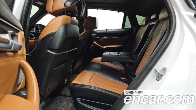 BMW X6 (F16) M50d 2017 — фото 11