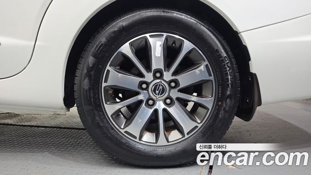 KG Mobility (SsangYong) Korando Turismo 4WD RX 11-seater 2016 — фото 21
