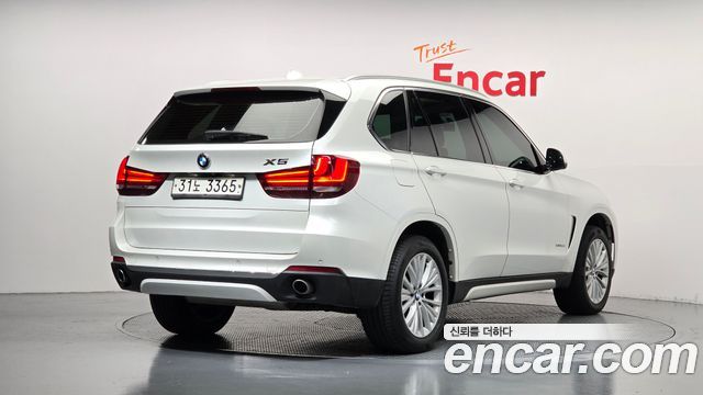 BMW X5 (F15) xDrive 30d 2014 — фото 2