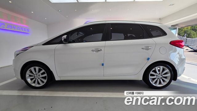Kia Carens 1.7 VGT Prestige 2014 — фото 4
