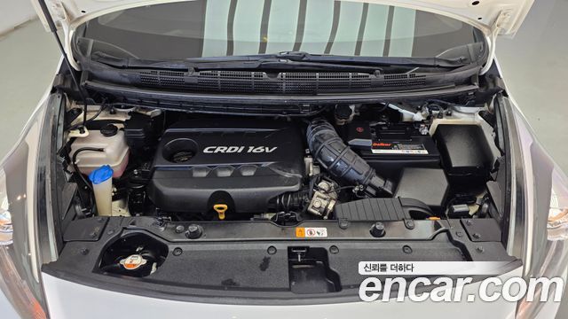 Kia Carens 1.7 VGT Prestige 2014 — фото 23