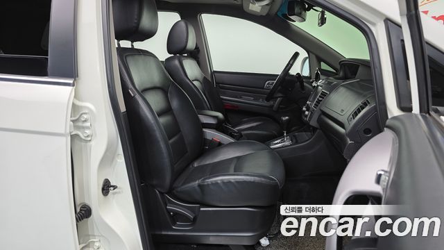 KG Mobility (SsangYong) Korando Turismo 4WD RX 11-seater 2018 — фото 11