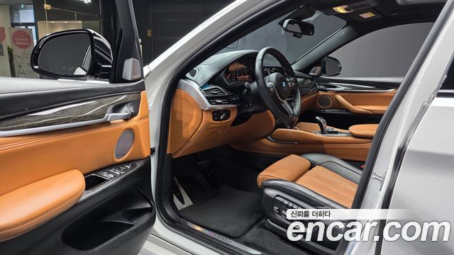 BMW X6 (F16) M50d 2015 — фото 10