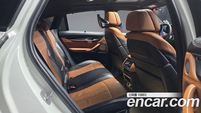 BMW X6 (F16) M50d 2015 — фото 11