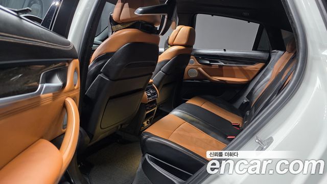 BMW X6 (F16) M50d 2015 — фото 12