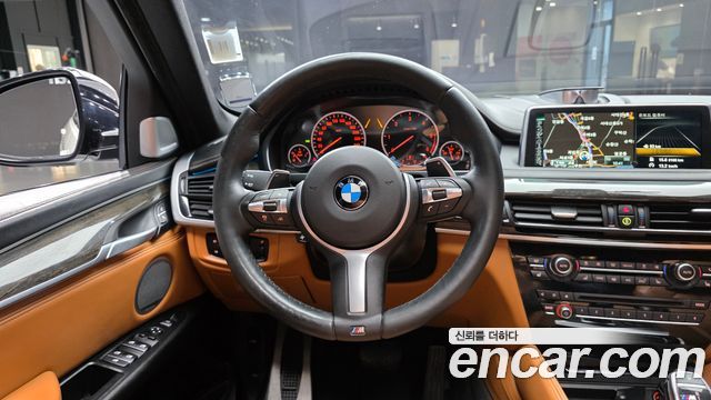 BMW X6 (F16) M50d 2015 — фото 14