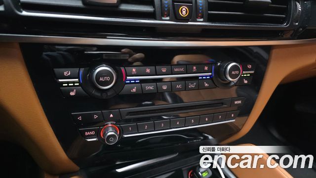 BMW X6 (F16) M50d 2015 — фото 17