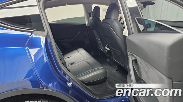 Tesla Model Y RWD 2025 — фото 11