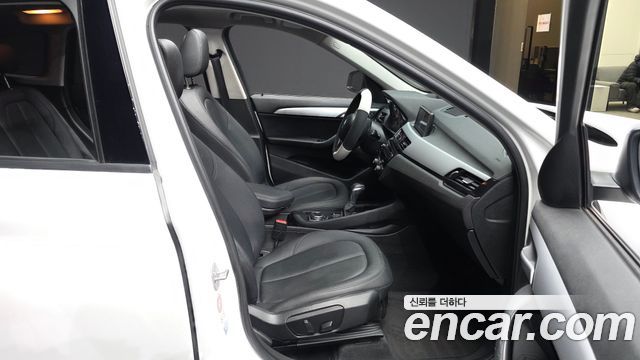 BMW X1 (F48) xDrive 18d 2016 — фото 11